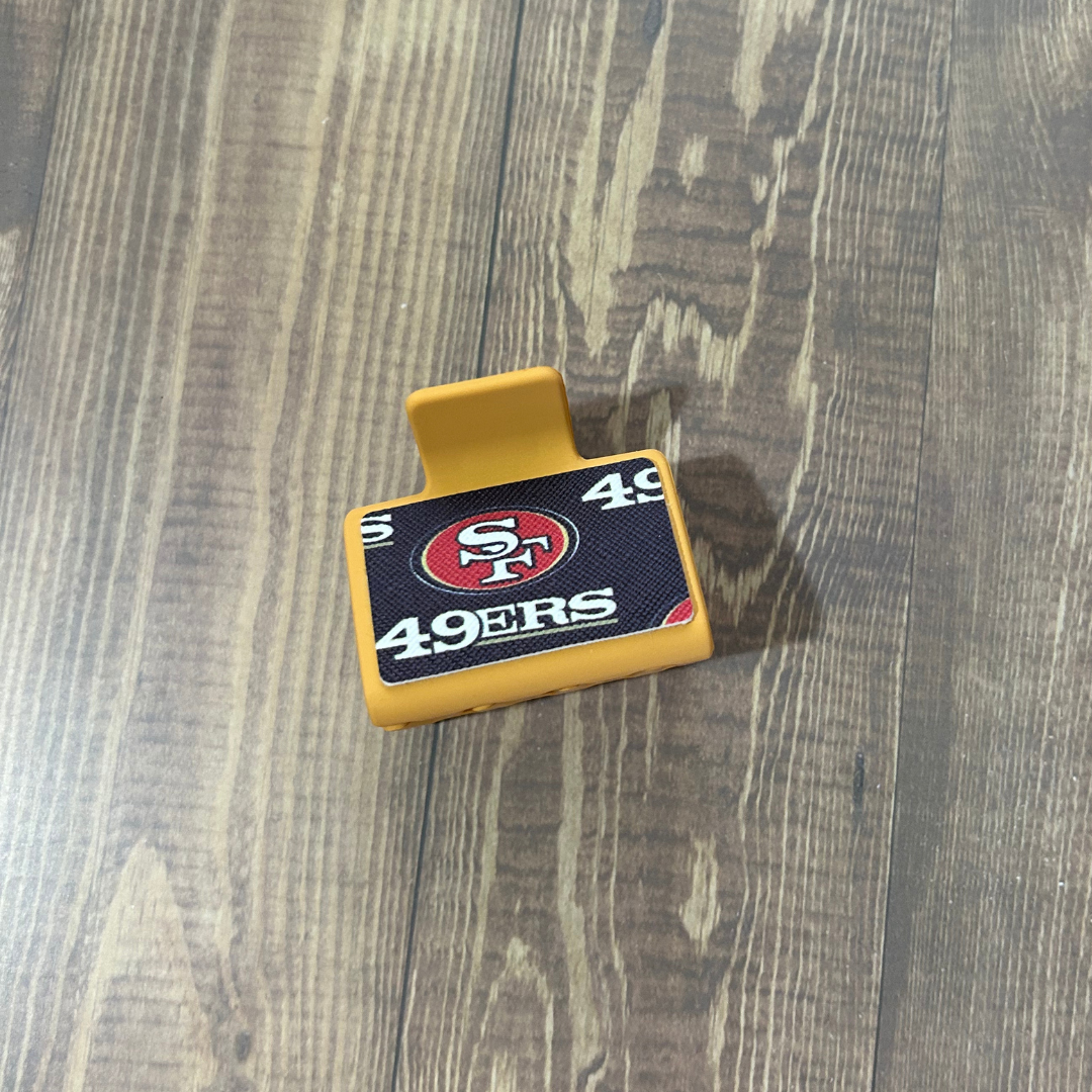 FOOTBALL LEATHER HAIR CLIPS