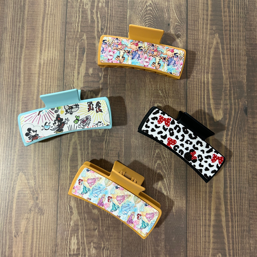 CHARACTER LEATHER HAIR CLIPS
